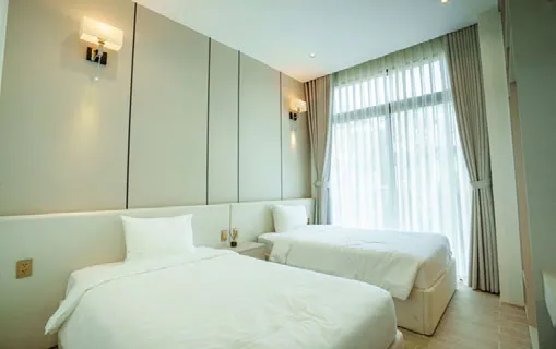 Phòng ngủ hai giường đơn dành cho khách thuê nhóm